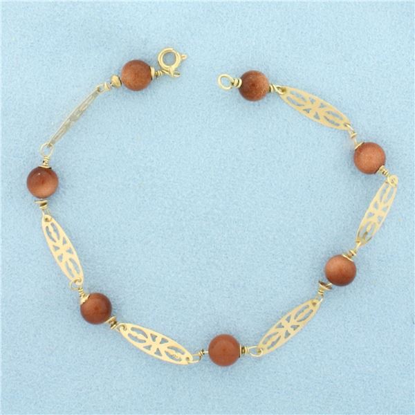 Orange Goldstone Bracelet in 14k Yellow Gold