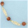 Image 2 : Orange Goldstone Bracelet in 14k Yellow Gold