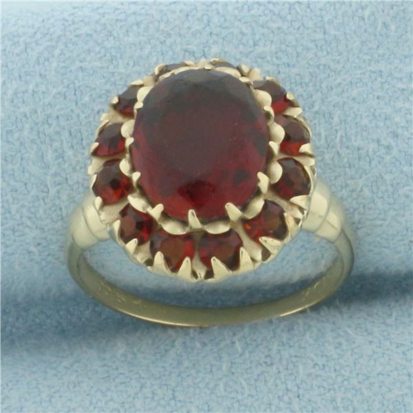 Vintage Garnet Halo Ring in 10k Yellow Gold