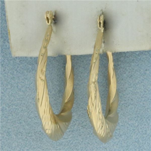 Twisting Spiral Hoop Earrings in 14k Yellow Gold