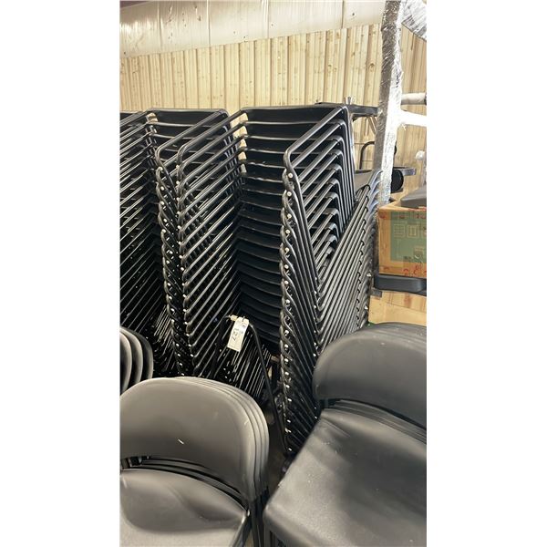 STACK OF 20 BLACK PLASTIC METAL FRAMED STACKING CHAIRS WITH MOBILE CHAIR CART