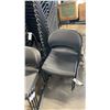 Image 1 : STACK OF 20 BLACK PLASTIC METAL FRAMED STACKING CHAIRS