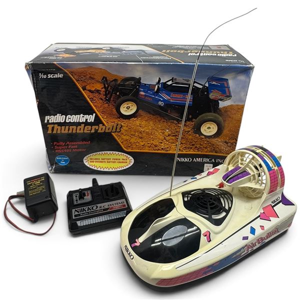 Vintage Nikko Thunderbolt 1/10 RC Buggy (Appears New) & Air Bullet Hovercraft w Transmitters & Box