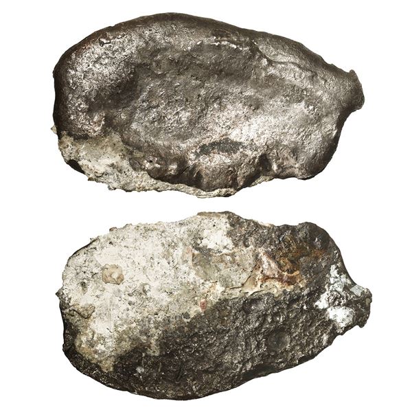 Small silver "splash" ingot, 3 oz troy (94.62 grams), with encrustation, no markings (probably contr
