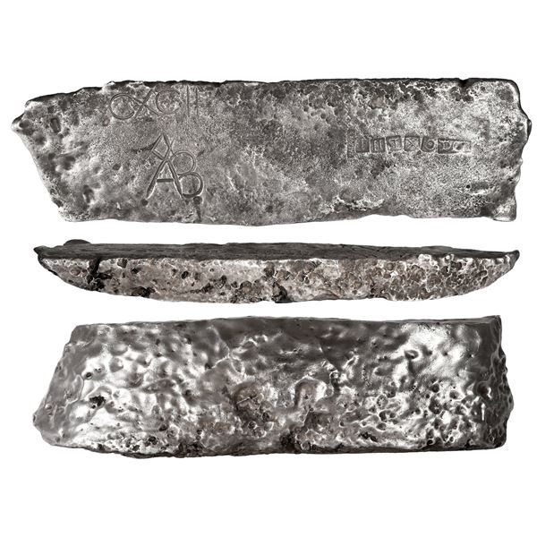 Large silver bar, 453.7 oz troy (14 kg), marked with fineness IIUCC C X L II I (2343/2400), assayer 