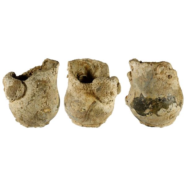 Small Delftware pitcher (handle missing), encrusted as found, ex-pirate ship Golden Fleece (1686).