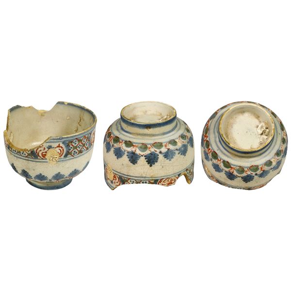 Small Delftware bowl colored red, blue, and green, ex-pirate ship Golden Fleece (1686).