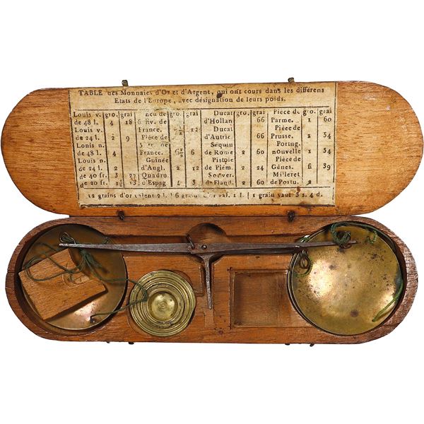 French balance scale for coins in original wooden case with paper table applied to lid, early 1800s.