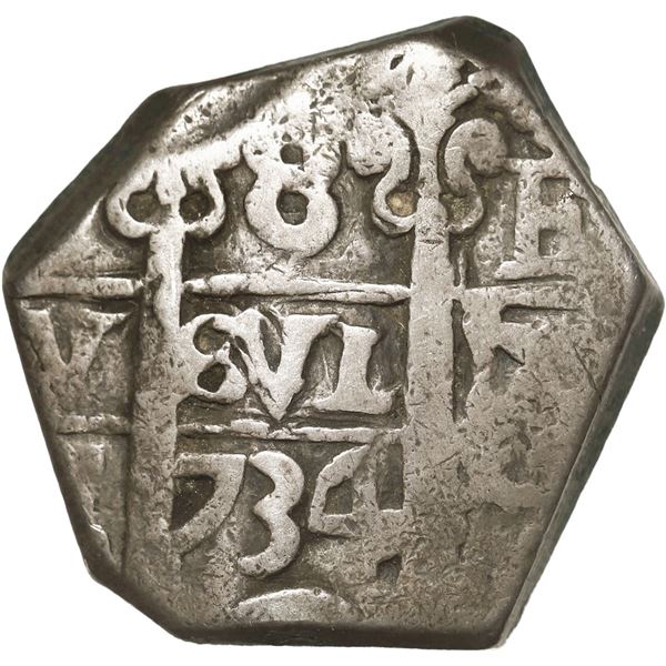 BOLIVIA, Potosí, cob 8 reales, 1734 E, cut down to North African (Barbary) standard.