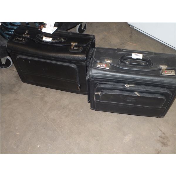 Two Brief Cases On Wheels