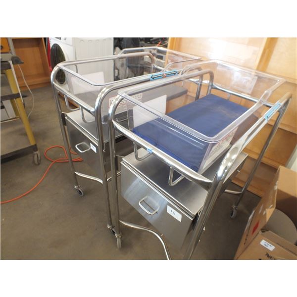 Two Bassinet Carts On Wheels