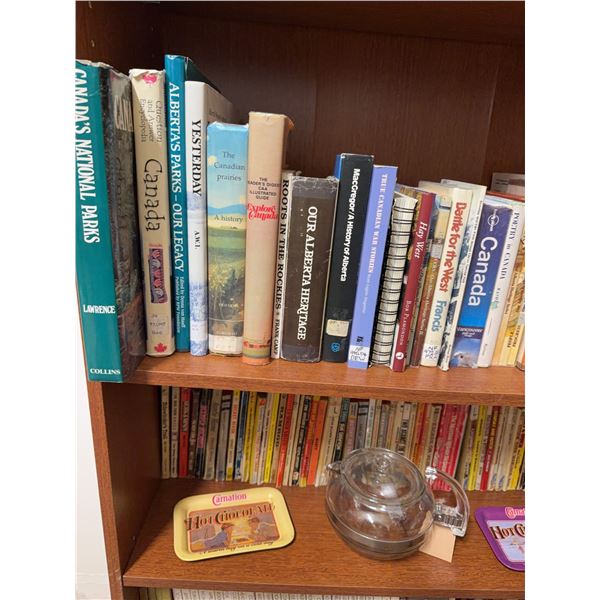 Bookshelf Lot: Canadian History Books, Western Paperbacks, Glass Teapot, Carnation Trays