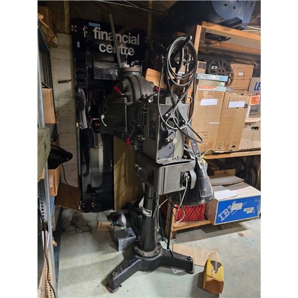 Vintage Professional 35mm Motion Picture Theater Projector Mounted on a cast-iron Pedestal Stand