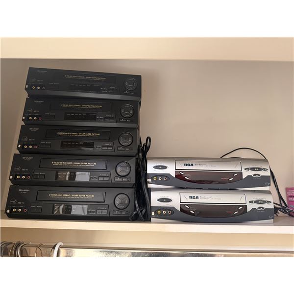 Lot of 7 VCRs: (5) Sharp 4-Head Hi-Fi Stereo & (2) RCA AccuSearch VHS Players