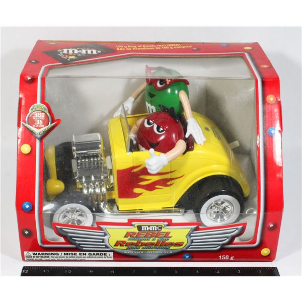 M&M REBEL WITH OUT A CLUE DISPENSER STILL IN BOX