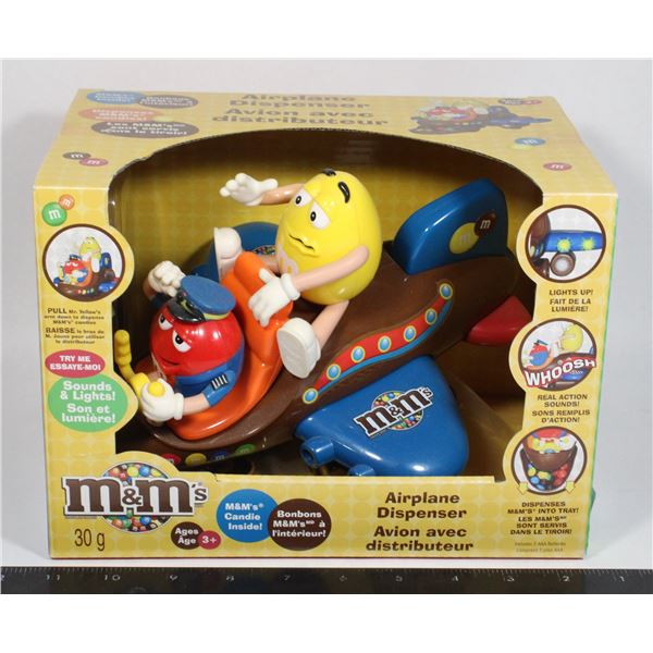 M&MS AIRPLANE STYLE CANDY DISPENSER FEATURING RED