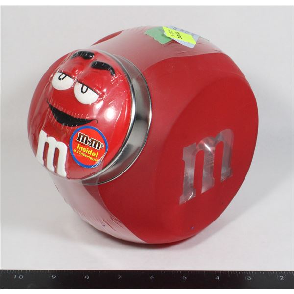 M&M CANDY CANISTER FEATURING RED. SOME MINOR SCRAT