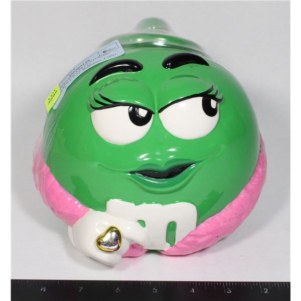 M&M CERAMIC JAR FEATURING GREEN STILL HAS SEAL