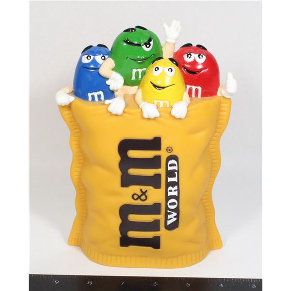 VINTAGE M&M WORLD MONEY BANK HAS PLUG IN BOTTOM