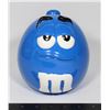 Image 1 : CERAMIC M&M JAR FEATURING BLUE WITH SOME CHIPS TO