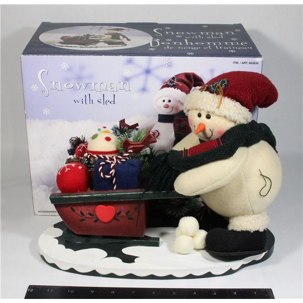 VINTAGE SNOWMAN WITH SLED IN ORIGINAL BOX.