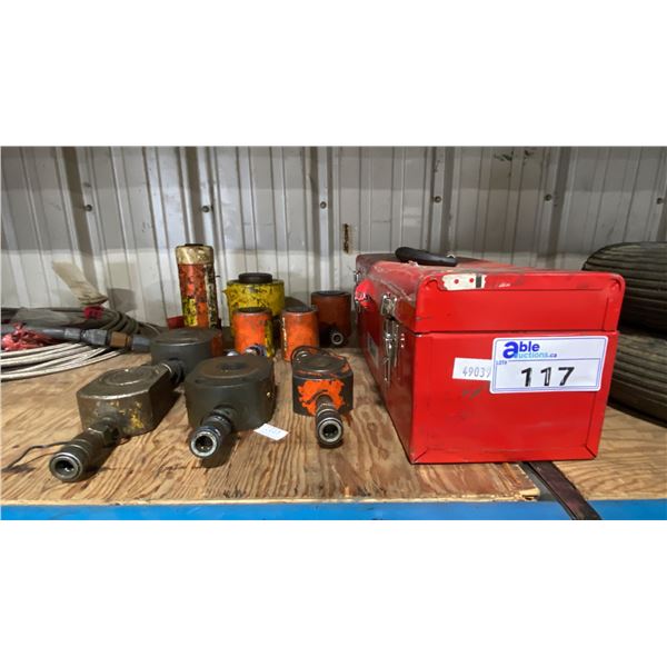 RED METAL TOOL BOX & ASSORTED HYDRAULIC RAMS