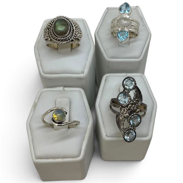 4 New Rings * all stamped .925 * (Larimar, Moonstone, & Blue Topaz Crystal) Longest ring  is 35 mm *