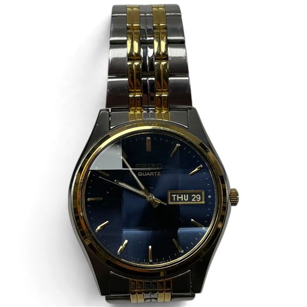Men's 1990s Seiko Day/Date Dress Watch with Special Angular Faceted Crystal Over a Blue Face * Model