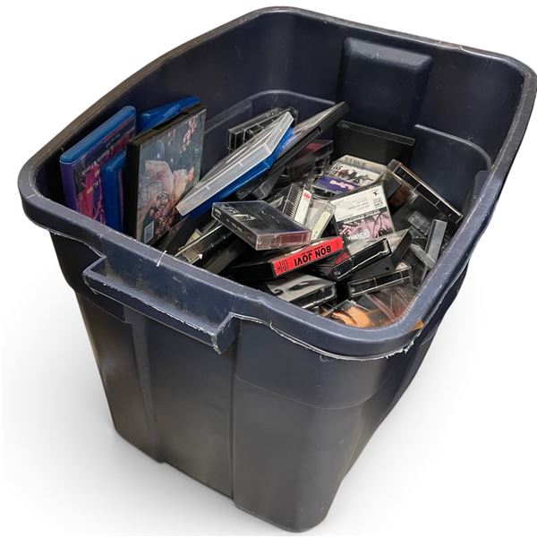 Assorted Videocassettes in Plastic Storage Bin