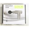 Image 1 : MASSAGE GUN IN BOX NEVER USED