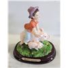 Image 1 : VINTAGE CROSA COLLECTION BOY RIDING PIG FIGURINE