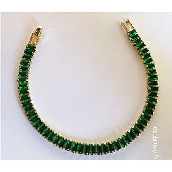 13)  GOLD TONE WITH EMERALD GREEN