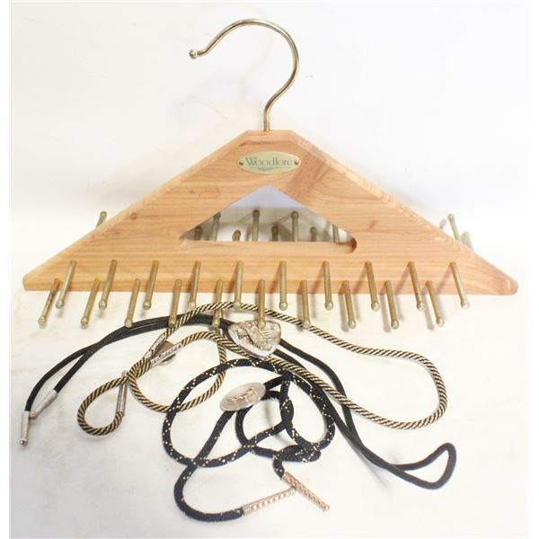 THREE BOLO TIES AND TIE HANGER