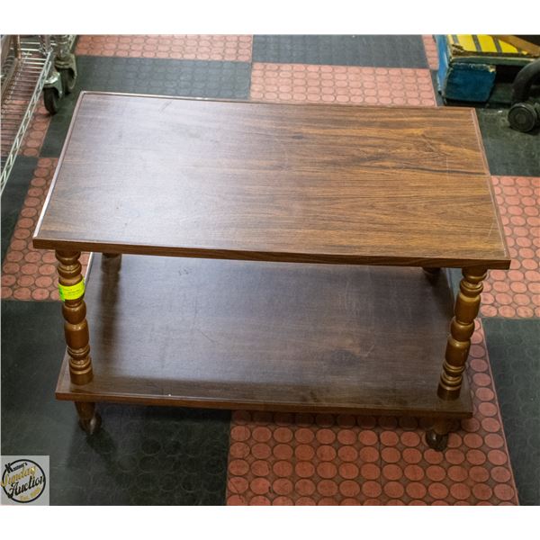 WOODEN SIDE TABLE ON CASTORS