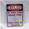 Image 1 : "WARNING - IF YOU CAN READ THIS YOURE IN RANGE"