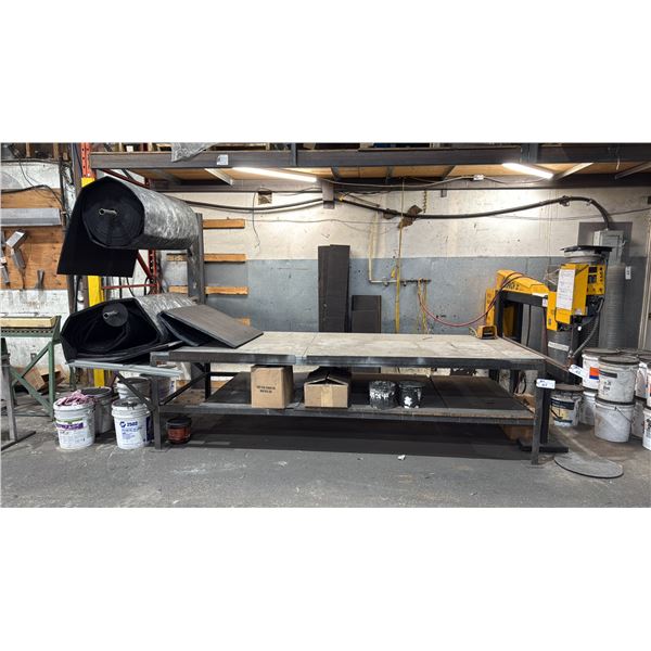 METAL SHOP TABLE WITH 2 WALL MOUNTED MATERIAL ROLL HOLDERS WITH 2 LARGE ROLLS OF DUCT