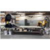 Image 1 : METAL SHOP TABLE WITH 2 WALL MOUNTED MATERIAL ROLL HOLDERS WITH 2 LARGE ROLLS OF DUCT