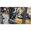 Image 4 : TCM FCG25D7 YELLOW PROPANE FORKLIFT WITH SOLID TIRES, 4 STAGE MAST, 6535 HOURS *HOURS NOT VERIFIED*