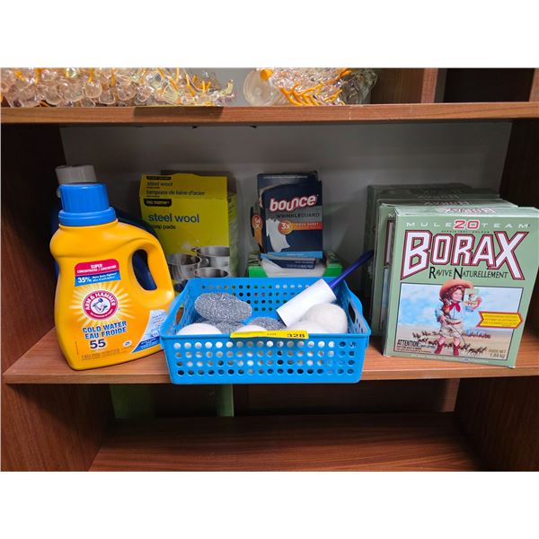 Group of Laundry and Cleaning Supplies including Arm & Hammer, Borax, and Bounce Brands