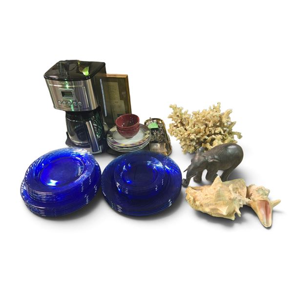 Group of blue glass plates, Cuisinart coffee maker, coral, shells, etc.