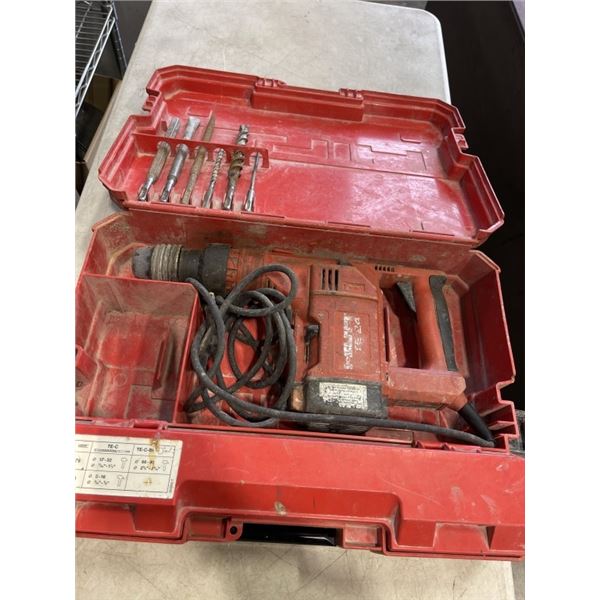 HILTI HAMMER DRILL WITH BITS. WORKING