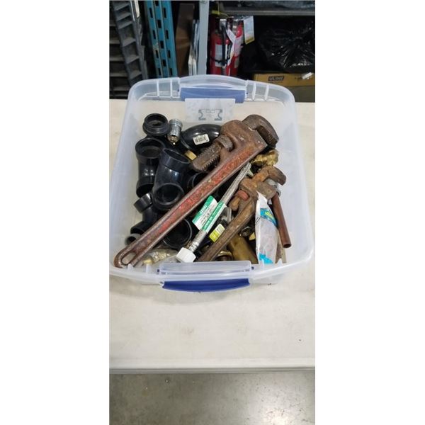 TOTE OF PLUMBING SUPPLIES INCLUDING WRENCHES, FITTINGS ETC