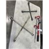 Image 1 : 2 TIRE WRENCHES AND A STEERING WHEEL LOCK WITH KEY