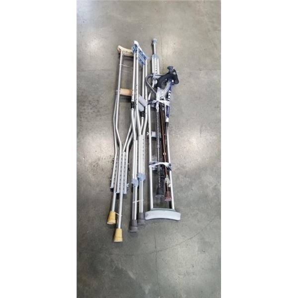 2 PAIRS OF CRUTCHES AND 3 CANES