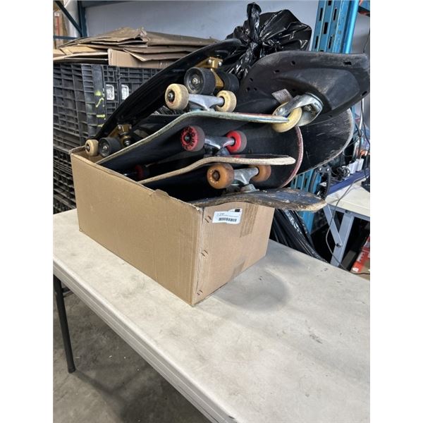 7 BOARDS INCLUDING 5 SKATE BOARDS