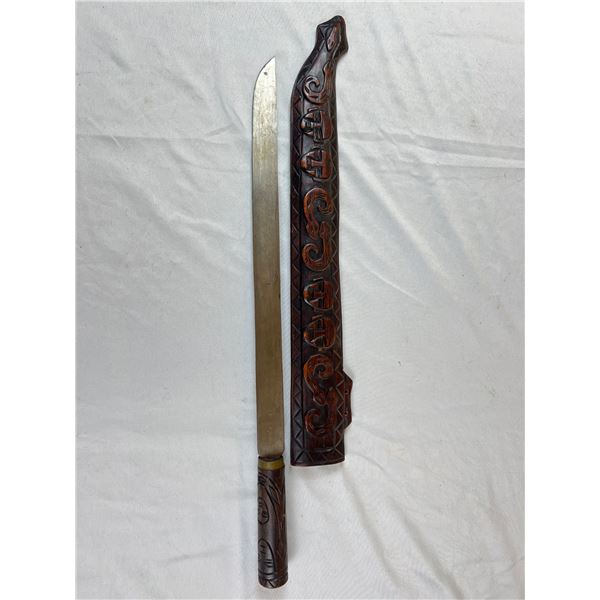 Sword With a Carved Wooden Sheath