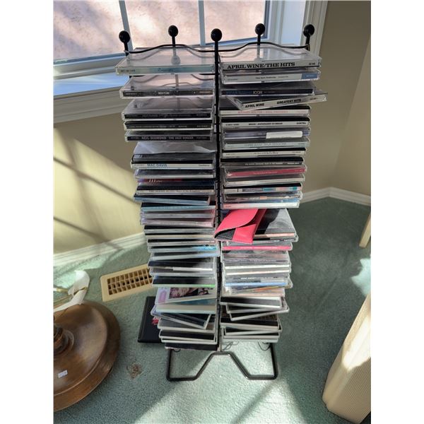 45 Pop, Rock, and Soundtrack CDs with Metal Rack Including April Wine and Neil Diamond