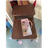 Image 1 : Closet Contents Including Table, Pink Stethoscope, Water Bottle, Hangers, and Bags