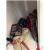 Image 3 : Closet Contents Including Table, Pink Stethoscope, Water Bottle, Hangers, and Bags