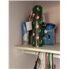 Image 7 : Closet Contents Including Table, Pink Stethoscope, Water Bottle, Hangers, and Bags